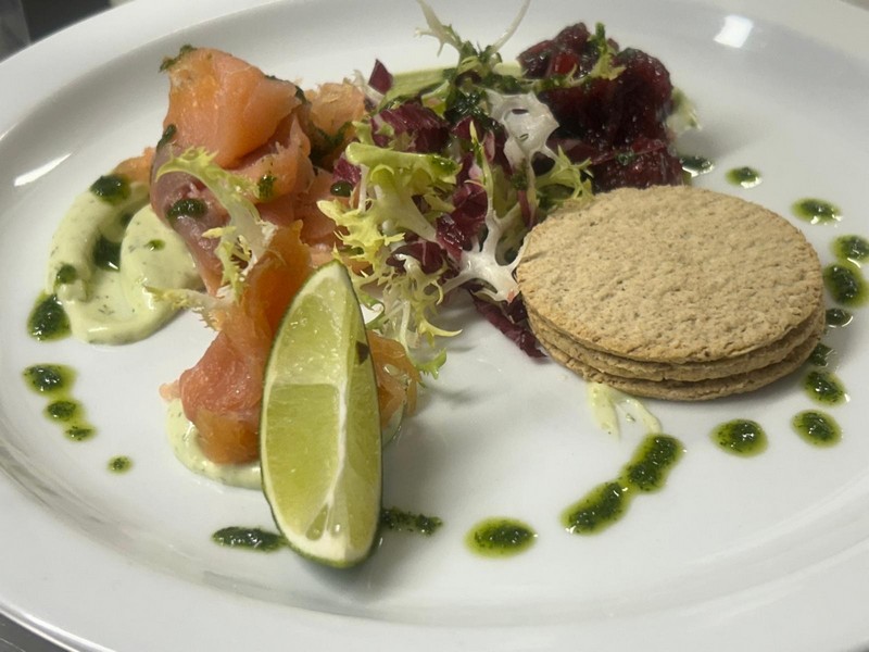 Smoked salmon with oatcakes, salad, lime and a dressing